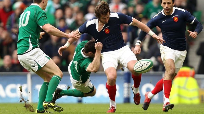 Fergus McFadden tackles Maxime Medard