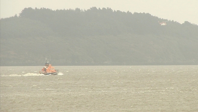 Rescue services - Boats and a helicopter are searched for missing fisherman