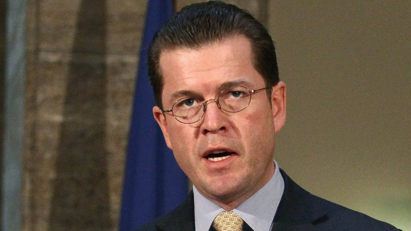 Karl-Theodor zu Guttenberg -Thanked Chancellor Merkel for her support