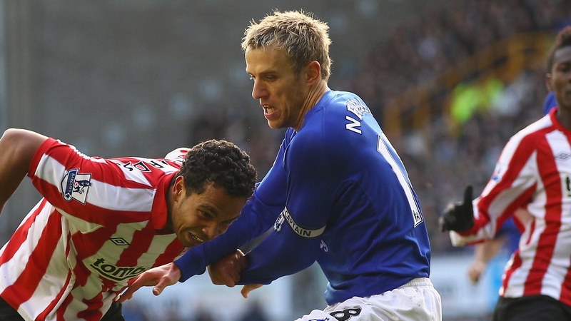 Phil Neville has been with the England U-21s this summer