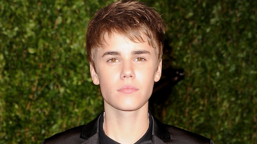 Bieber - Mistaken for 'crazed fan'