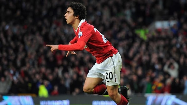 Fabio celebrates opening the scoring at Old Trafford