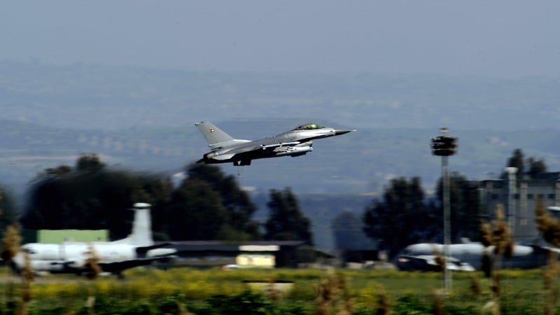 A Danish fighter jet takes off from Sigonella military airport in Italy