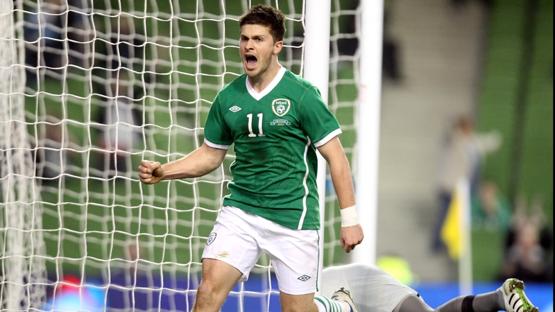 Shane Long celebrates scoring his first-half headed equaliser against Uruguay