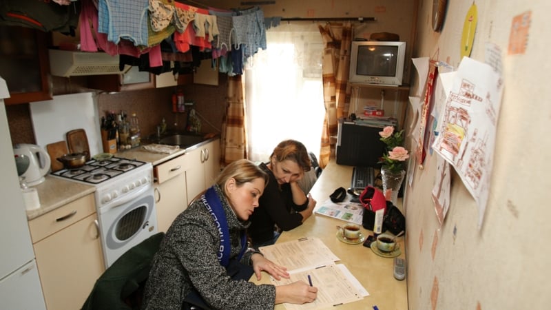Census - A census workers asks a woman questions in the village of Murino, near Saint-Petersburg
