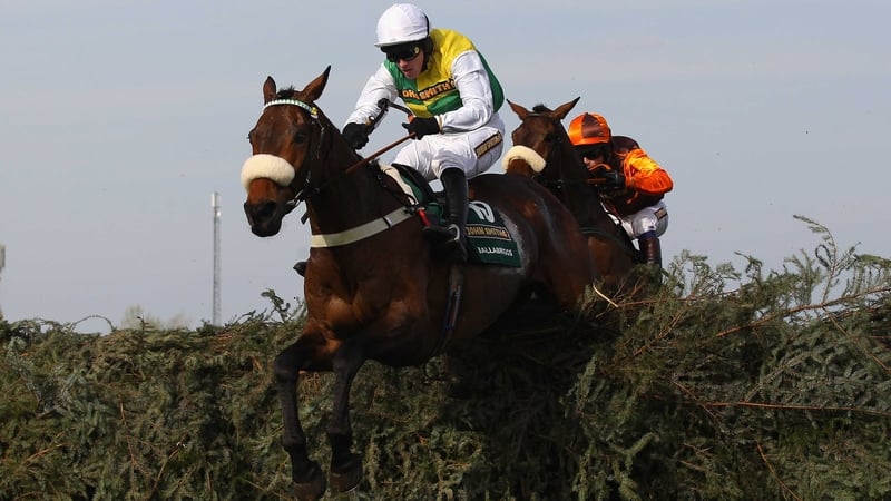 Ballabriggs - jumps the last fence on his way to victory in the 2011 Aintree Grand National