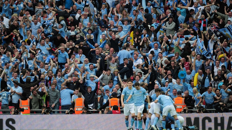 Manchester City players celebrate Yaya Toure's goal