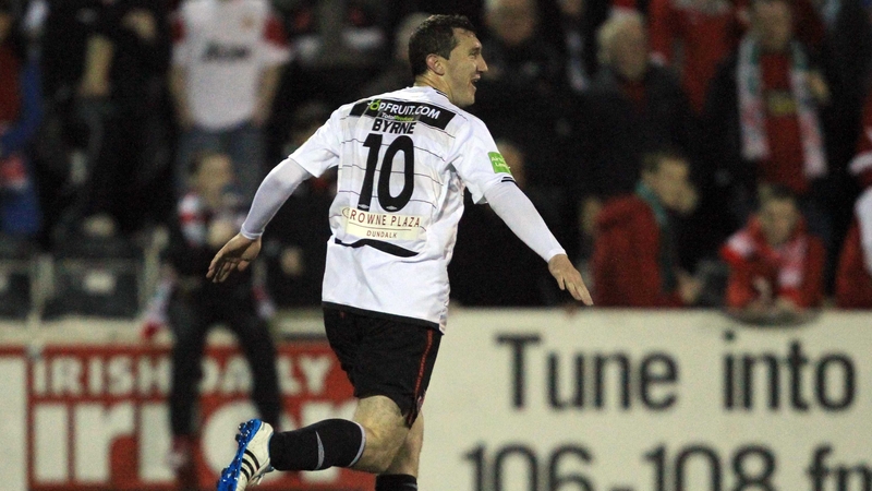 Jason Byrne celebrates his fine header at Oriel Park