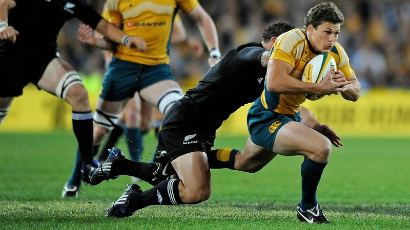 Luke Burgess and Luke McAlister - in Bledisloe Cup action for New Zealand and Australia