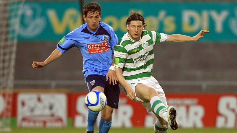 Graham Rusk and Ken Oman - the pair tussle for the ball