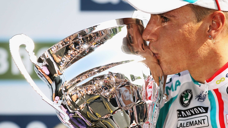 Philippe Gilbert of Belgium and Omega Pharma-Lotto kisses the trophy after winning the 97th Liege-Bastogne-Liege race