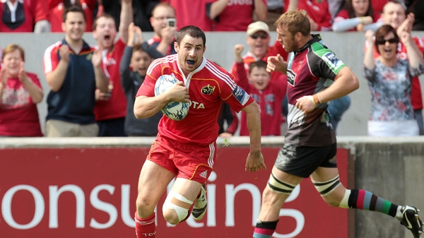 Felix Jones crosses for Munster's first try but they could not cope with the determined Harlequins side