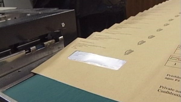 Exchequer figures were boosted by an unexpected corporation tax payment