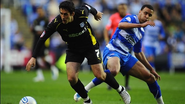 Dull encounter - Peter Whittingham of Cardiff City is challenged by Hal Robson-Kanu of Reading