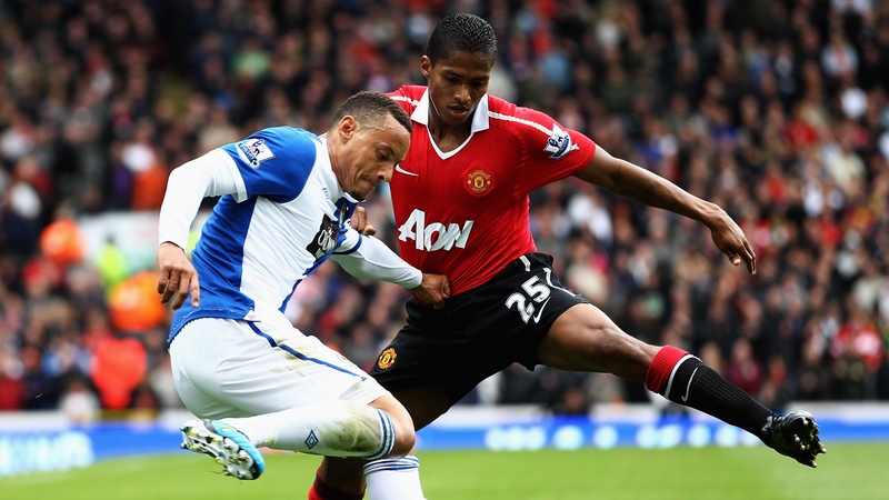 Red Devils take title - Blackburn's Jermaine Jones and Manchester United's Antonio Valencia in action at Ewood Park