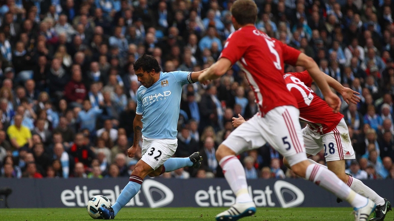Carlos Tevez - scoring the opening goal in Manchester City's 3-0 victory over Stoke City