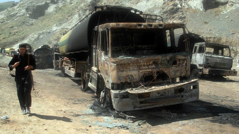 Pakistan - The wreckage of a charred NATO supply oil tankers from 14 May