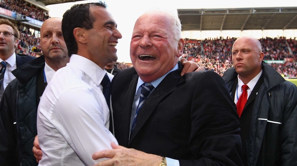 Wigan manager Roberto Martinez and owner Dave Whelan celebrate staying up