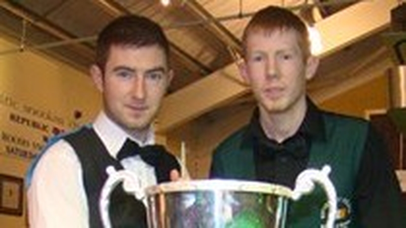 Triple champion - Jason Devaney (r) poses in front of the trophy with David Hogan