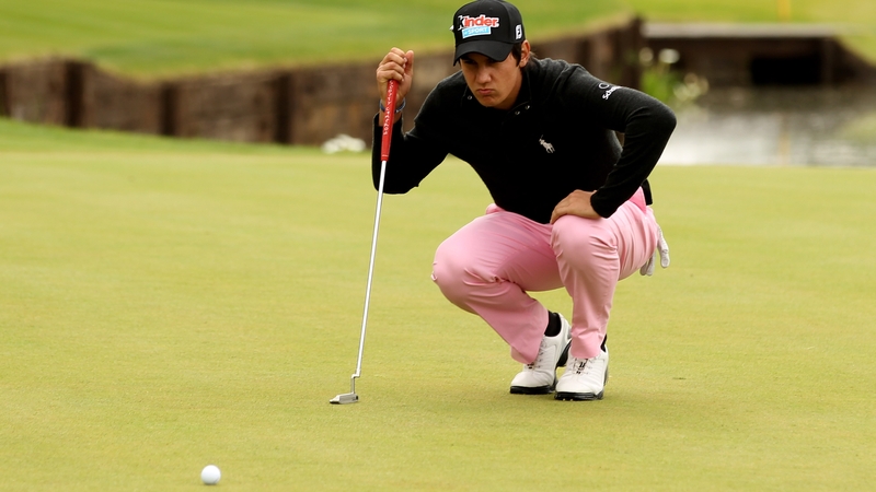 Matteo Manassero - Lines up a putt on the 18th