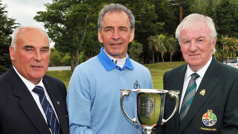 Hugh Smith - Receives the trophy
