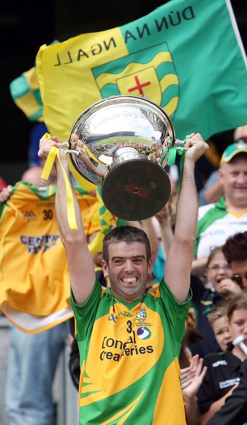 Donegal captain Colm Breathnach lifts the Lory Meagher Cup in 2011