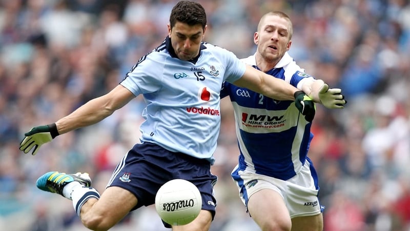 Bernard Brogan of Dublin with Cahir Healy of Laois