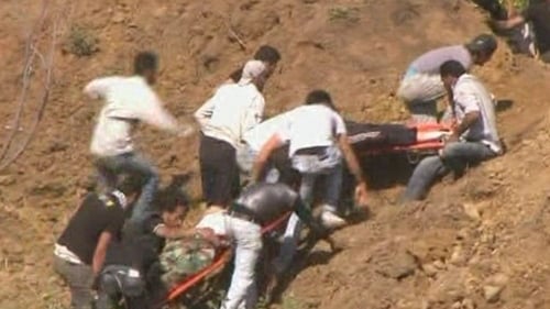 Syria - Demonstrators carried away on stretchers