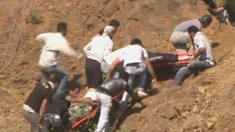 Syria - Demonstrators carried away on stretchers