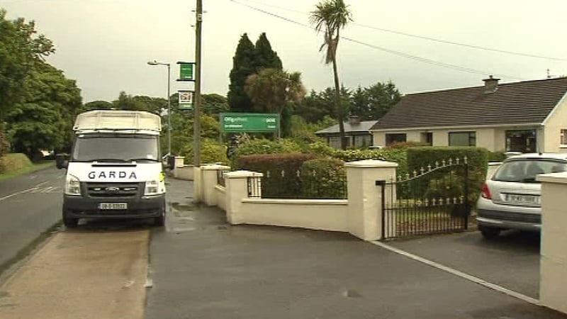 Oulart - Mother and son shot in raid on post office