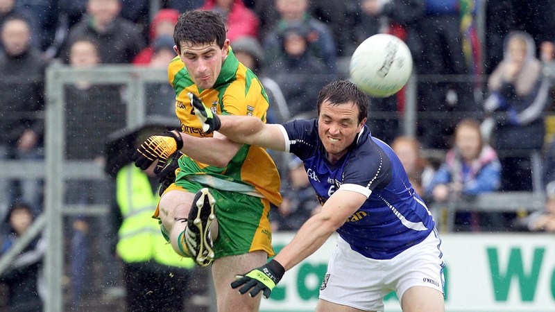 Cavan's John McCutcheon attempts to block Donegal's Paddy McBrearty