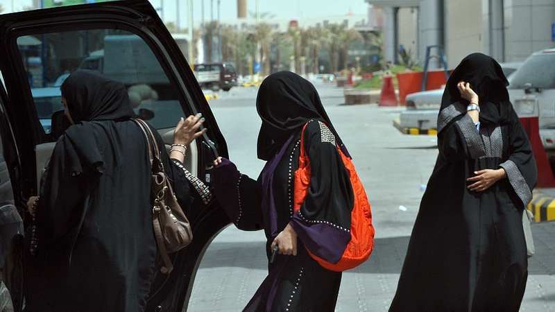 Saudi women enter a car as passengers earlier this week - today some drove