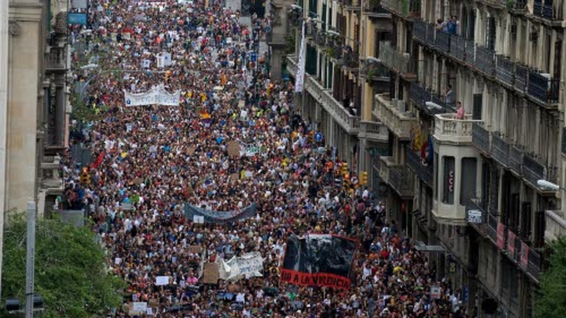 Barcelona - At least 50,000 people turned out to protest yesterday