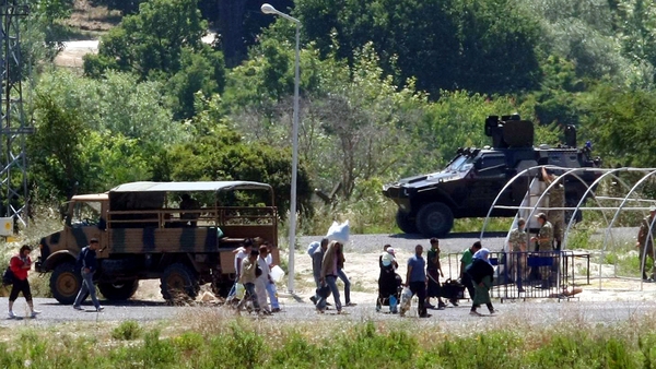 Turkey - Syrians arriving across the border