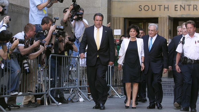 Dominique Strauss-Kahn leaving court after the hearing with his wife