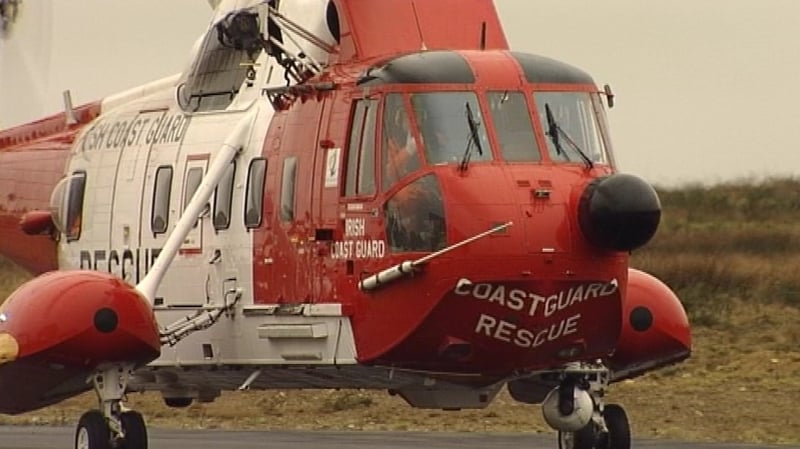Coast Guard - Airlifted crew member from rocks