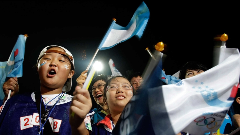 Residents in PyeongChang celebrate after the city is awarded 2018 Olympics