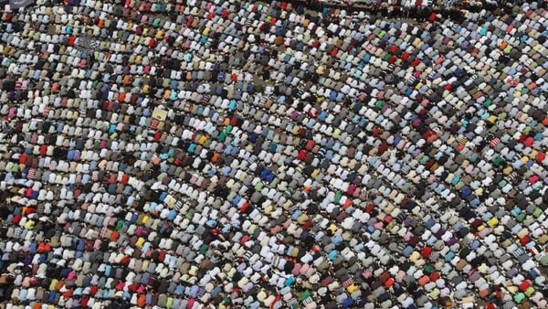 Egyptians - People attend prayers ahead of protests
