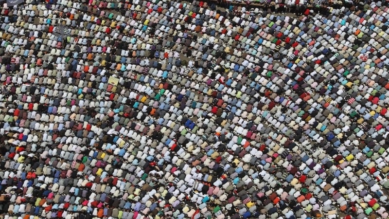Egyptians - People attend prayers ahead of protests