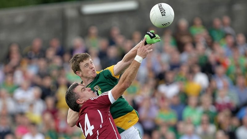 Kevin Reilly of Meath and Padraig Joyce of Galway contest the breaking ball