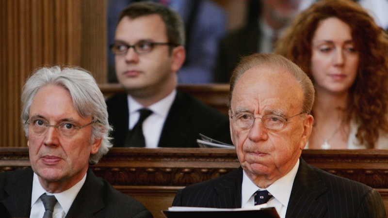 Resignations - Les Hinton with Rupert Murdoch in 2005; Rebekah Brooks &amp; Andy Coulson are seated behind them