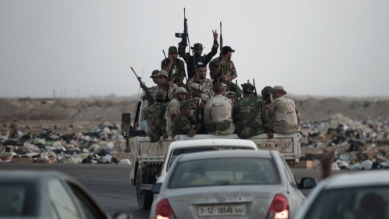 Libya - Rebel fighters make their way to the Brega frontline