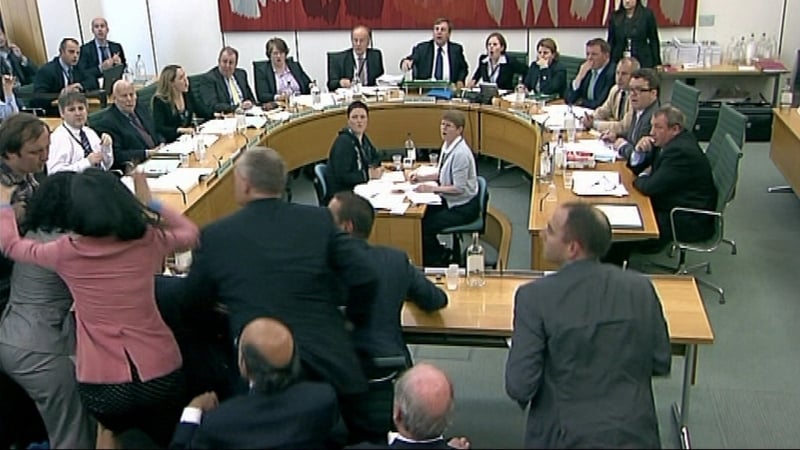Commons Committee - Rupert Murdoch's wife Wendi (in pink) leaps to the defence of her husband