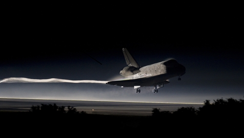 NASA space shuttle Atlantis lands at Kennedy Space Center in Florida.