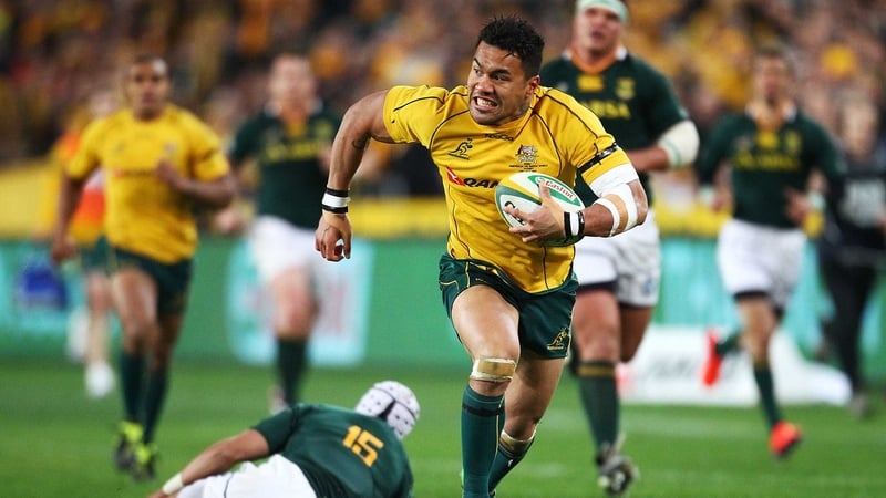Digby Ioane races past Gio Aplon - South Africa could not contain Australia's pace and precision in attack