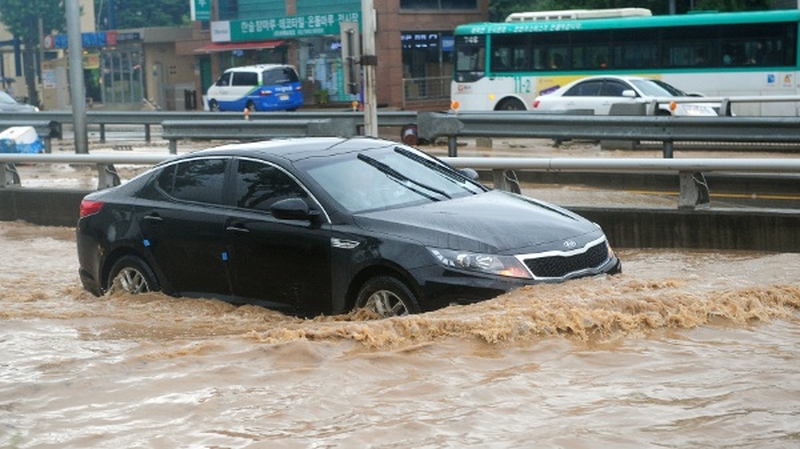 Seoul - Roads and train stations have been flooded