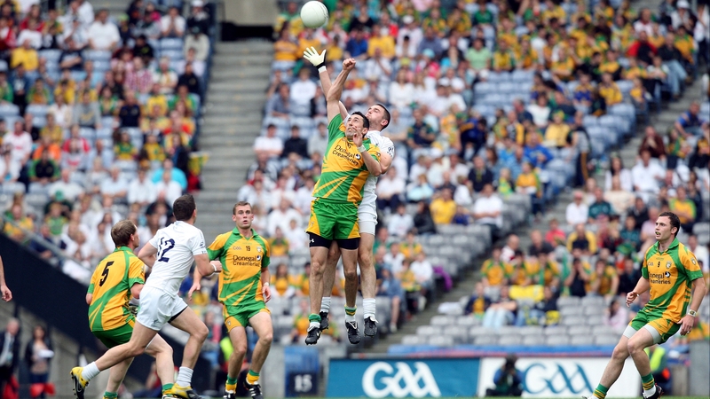 Rory Kavanagh goes up for a high ball against Kildare