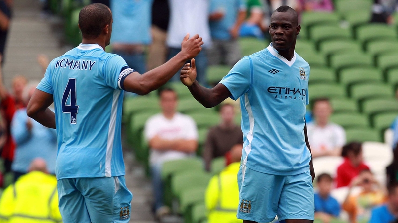 Mario Balotelli celebrates one of the Manchester City goals