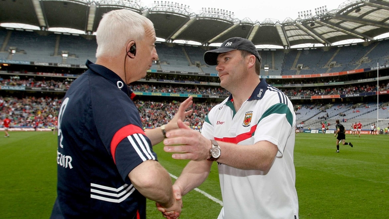 Conor Counihan (l) congratulates James Horan after Cork lost to Mayo