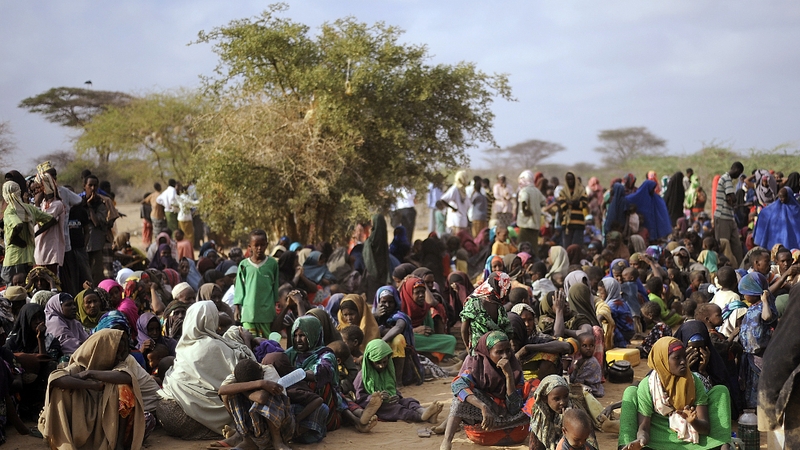 Somali refugees line-up at a registration centre